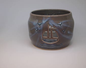 Ceramic Candle Holder with Hand Carved Decorative Sailboat and Anchor Cut Outs