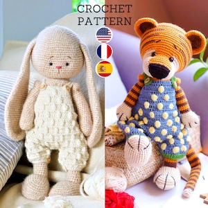 May include: Crochet pattern for a beige bunny and an orange and brown tiger wearing overalls. The bunny has long ears and a pink nose. The tiger has a black nose and black stripes. Both toys are wearing blue and white polka dot overalls.