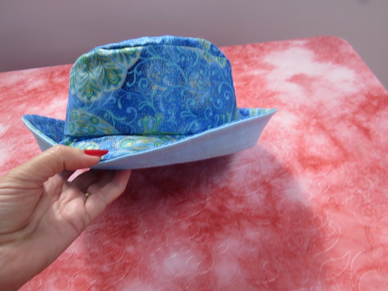 large blue peacock sun hat