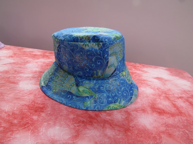 large blue peacock sun hat