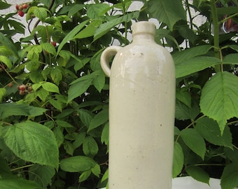 Vintage glazed stoneware bottle from the 1970s/80s. (Antique liquor bottle)