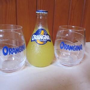 Dos vasos ORANGINA, vasos publicitarios, vasos de bar, brasserie o restaurante