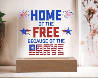 Placa acrílica patriótica "Hogar de los libres gracias a los valientes"