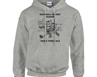 Sudadera con capucha de la Liga de Hockey Hairball – Divertida sudadera con capucha de gato de hockey que se vuelve peluda y dorada