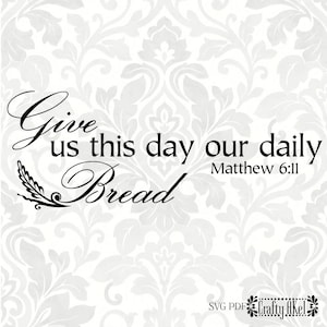 May include: Black and white graphic design with a wheat stalk and the text "Give us this day our daily Bread Matthew 6:11".