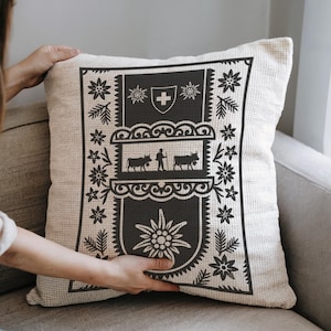 Swiss Alps Paper Cutout Woven Pillow, Cattle And Trees Coat of Arms, Cotton-Mix Cushion | Edelweiss Shield Pattern - Customizable