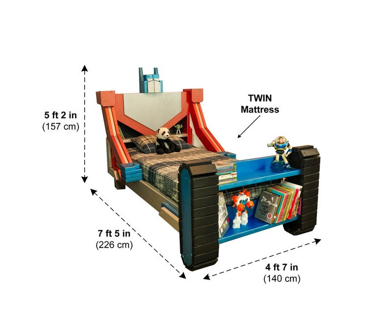 May include: A red, blue, and gray wooden twin-sized bed frame with a robot design. The bed frame has a built-in shelf with two shelves. The bed frame is 7 feet 5 inches long, 5 feet 2 inches tall, and 4 feet 7 inches wide. The bed frame is designed to fit a twin-sized mattress.
