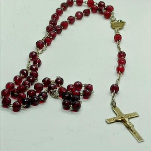 old rosary from the beginning of the 20th century in 5mm garnet seed glass beads, gold-plated child crucifix, St. Virgin/Christ medal
