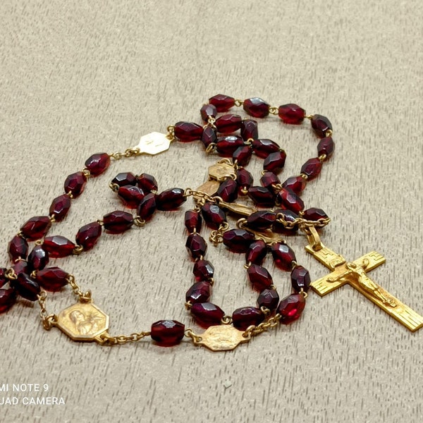 old rosary early XX rosary in garnet glass beads, old rosary in garnet glass, gold plate crucifix, 7 St. Virgin woman medals