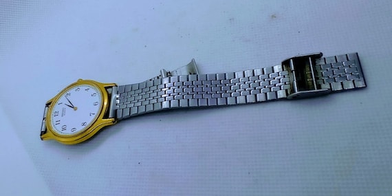 マブページ SEIKO V700 Seiko Quartz Gold Tone Slim Vintage Men's Watch V700-8A10 | eBay