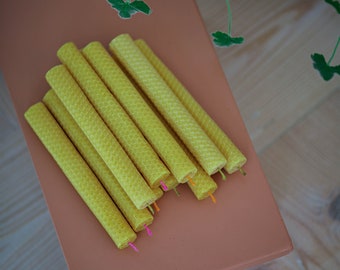 Set of 2 rolled 100% pure beeswax candles with cheerful, colorful cotton wicks.