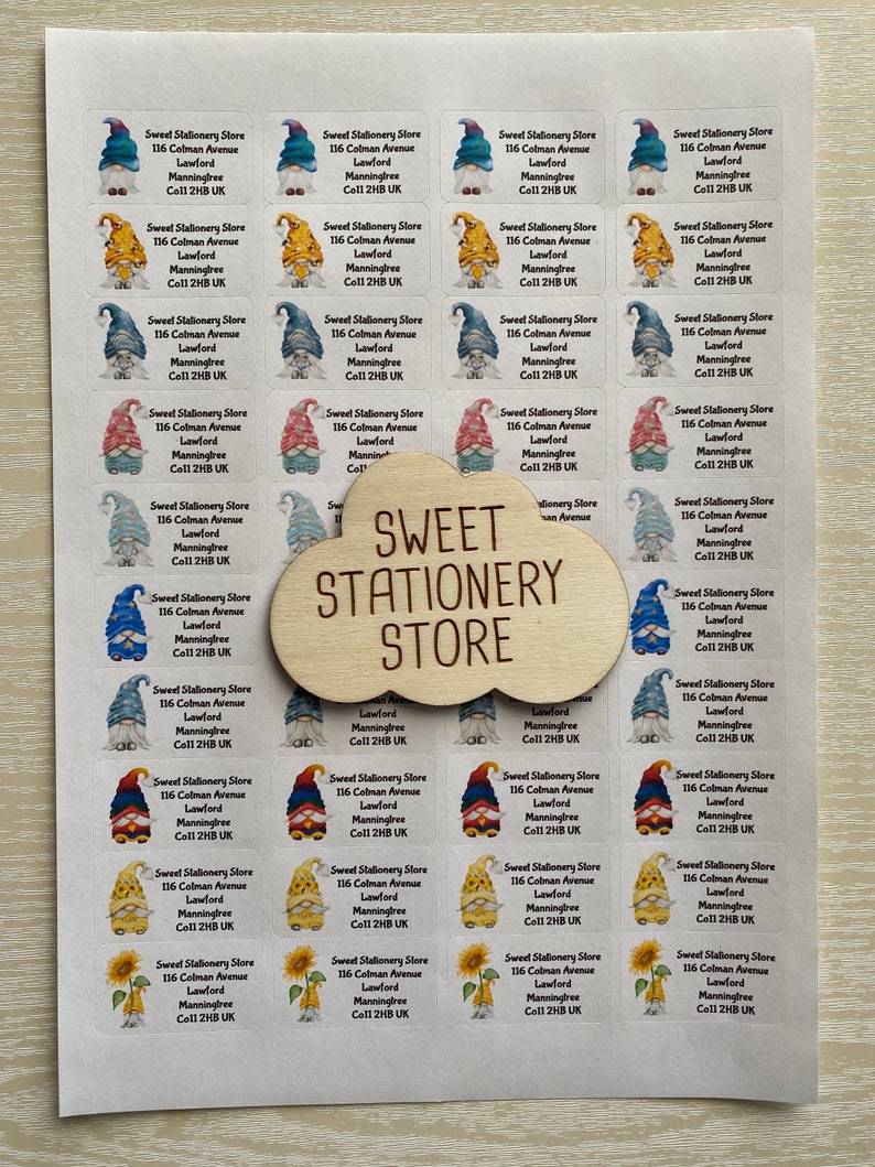 May include: A sheet of colorful stickers featuring a gnome design. The stickers have the text "Sweet Stationery Store" and the address "116 Colman Avenue, Lawford, Manningtree, Co11 2HB UK".