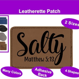 May include: Brown leatherette patch with the word "Salty" in black cursive lettering and the text "Matthew 5:13" below. The patch has an adhesive back and is available in multiple colours and shapes.