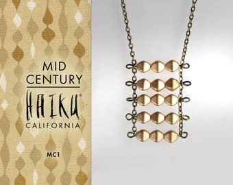 Mid Century van HaikuCalifornia: Geometrische matgouden ladderketting met bronzen ketting.