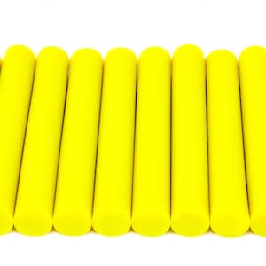 May include: A collection of ten bright yellow cylindrical objects, arranged horizontally against a white background. Each object has a rounded top and bottom, and a consistent diameter. The objects are evenly spaced.