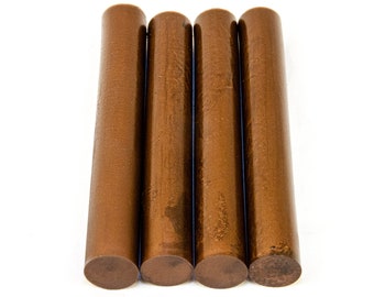 May include: Four brown wax sticks for sealing envelopes or packages.