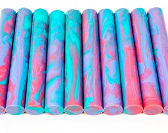 May include: Ten colorful acrylic pen blanks with a swirling pattern of pink, blue, and turquoise.
