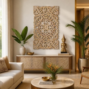 May include: A rectangular wooden wall panel featuring intricate carved floral and scrollwork patterns in a light brown finish with gold highlights, mounted above a long wooden sideboard with textured cabinet doors and a smooth top surface.