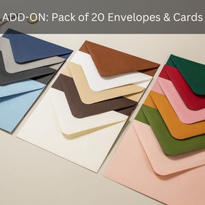 May include: A collection of colorful envelopes and cards in various shades, including blue, brown, and pink. The image shows a variety of stationery items, perfect for sending letters or notes. The text "ADD-ON: Pack of 20 Envelopes & Cards" is visible.