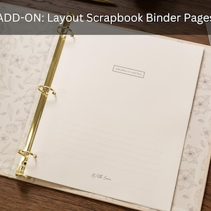 May include: Open scrapbook binder with gold rings and floral patterned pages. The open page has lines and the text "add photos or card here" and "With Love." The cover has a floral design.