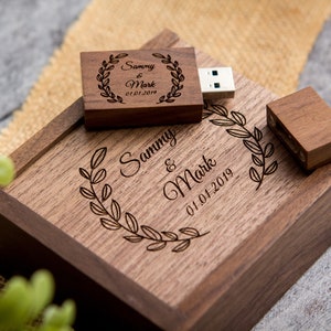 May include: A wooden box with a personalized engraved message, "Sammy & Mark 01.01.2019", and a matching engraved wooden USB drive.