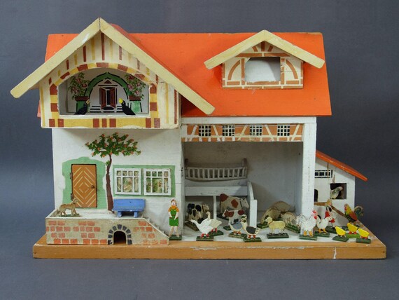 wooden dollhouse red roof
