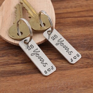 25th Silver Wedding Anniversary pair of personalised pewter matching key rings