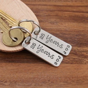 25th Silver Wedding Anniversary pair of personalised pewter matching key rings