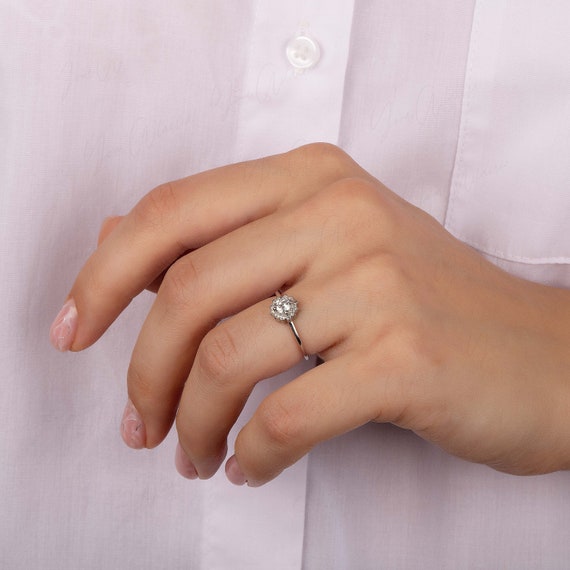 STERLING SILVER CZ HALO RING. STERLING SILVER CZ HALO RING.
