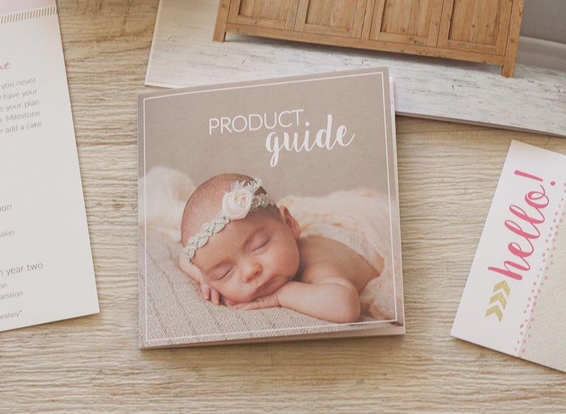 May include: A product guide booklet with a photo of a baby girl wearing a white headband with a flower on it. The text on the cover reads "PRODUCT. guide".