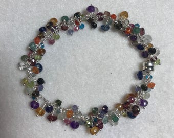 Pulsera de plata fina hecha a mano con múltiples piedras preciosas facetadas y rondelle