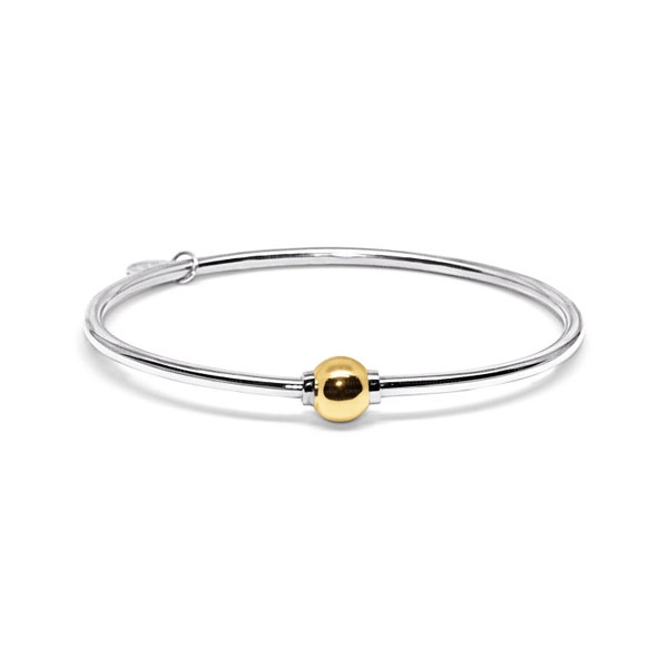 Made on Cape Cod. Bracelet made in Sterling Silver with a 14k Yellow Gold Ball.