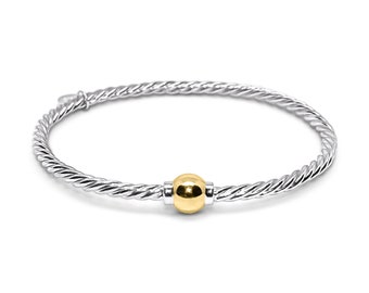 Bracelet Cape Cod torsadé en argent sterling avec une boule en or 14 carats ou en argent sterling.