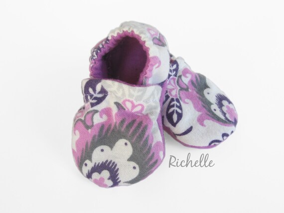 purple infant shoes