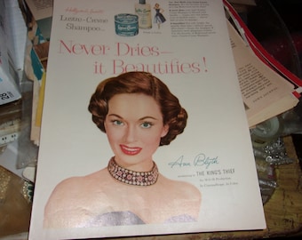 Anuncio de revista vintage de página completa a doble cara para el champú Lustre-Creme en un lado y un anuncio para la lavadora automática Blackstone Cloths