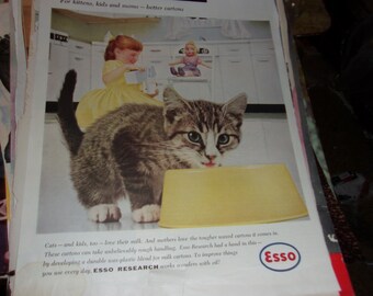 full page vintage magazine advertisement for Esso Research