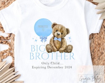 May include: White t-shirt with a blue balloon that says "Promoted to Big Brother". A brown teddy bear with a blue bow tie is holding the balloon. The text "Only Child... Expiring December 2024" is below the bear.