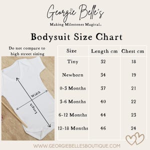 May include: A white bodysuit size chart from Georgie Belle's. The chart displays sizes from Tiny to 12-18 Months with corresponding length and chest measurements in centimeters. A visual guide shows a white bodysuit with arrows indicating width and length.