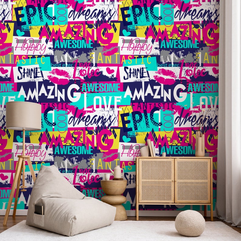May include: A colorful wallpaper with a repeating pattern of words like "amazing", "love", "epic", "dreams", "happy", "awesome", "fantastic", and "shine". The words are in different colors and fonts, and some are outlined in black. The wallpaper is a great way to add a pop of color and personality to any room.