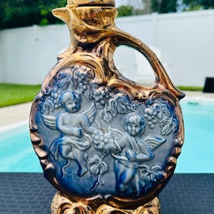 1970 Jim Beam “Cherubs” Whiskey Decanter