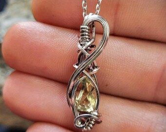 Small Golden Cubic Zirconia pendant in silver