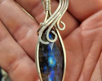 Sterling Silver Pendant with a deep blue flash labradorite marquis cabochon