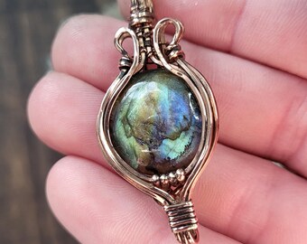 Shimmery Blue Flash Round Labradorite Pendant in Polished Copper Wire Wrapping