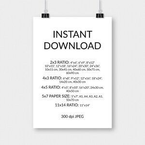 May include: A white poster with the words "INSTANT DOWNLOAD" in large, bold, black letters. Below, various print sizes are listed, including inches and centimeters, such as 4"x6", 10x15 cm, and 11"x14". The poster is held by two black binder clips.