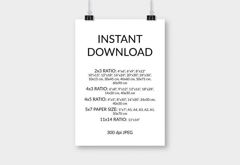May include: A white poster with the words "INSTANT DOWNLOAD" in large, bold, black letters. Below, various print sizes are listed, including inches and centimeters, such as 4"x6", 10x15 cm, and 11"x14". The poster is held by two black binder clips.