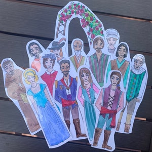May include: A set of 12 paper dolls depicting characters in various colorful costumes. The dolls are arranged in a semi-circle around a floral archway. The dolls are all hand-drawn and painted in a whimsical style.