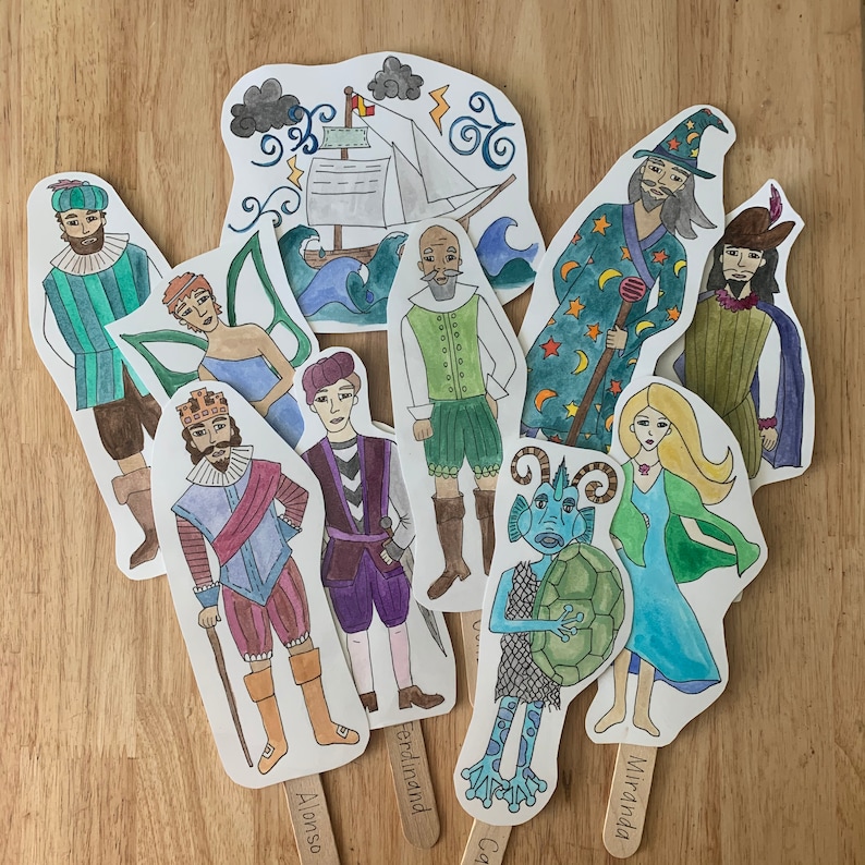 May include: A set of ten colourful paper character cutouts, each with a unique design and name. The characters include a king, a queen, a wizard, a mermaid, a sea monster, a pirate, a knight, a princess, a fairy, and a sailor. The cutouts are ideal for storytelling, role-playing, or decorating.