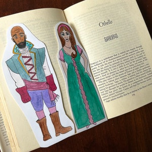 May include: A hand-drawn illustration of two characters from the play Othello. The first character is a man with dark skin, wearing a blue and red outfit. The second character is a woman with long brown hair, wearing a green and pink dress. The text "Othello" is visible in the background.
