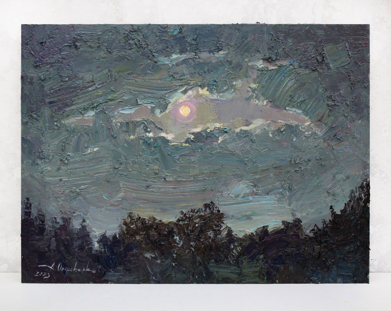 May include: An original oil painting depicting a night landscape. The artwork features a full moon peeking through the clouds, with a dark forest silhouette in the foreground. The color palette includes shades of gray, blue, and hints of yellow.