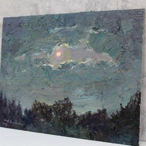 May include: An original oil painting depicting a night landscape. The artwork features a full moon peeking through the clouds, with a dark forest silhouette in the foreground. The painting is signed and dated 2023.